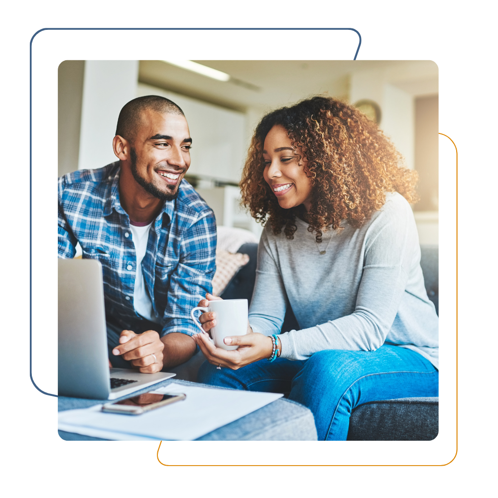 Home buyers reviewing home purchase loan options together