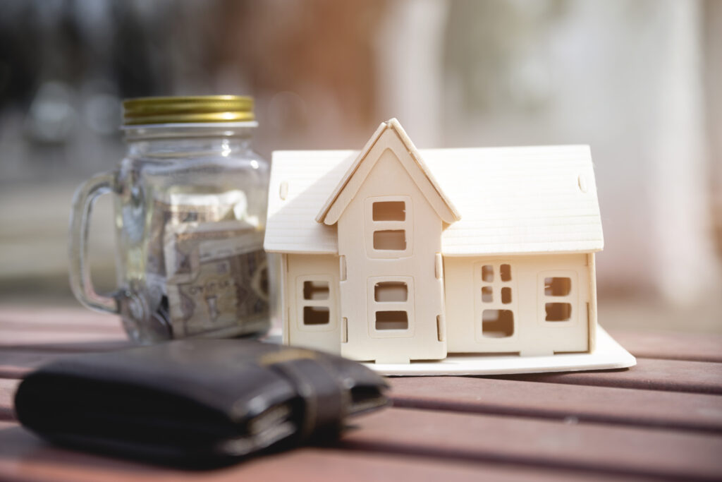 Oregon home with financial charts and rising equity graph representing smart home equity optimization strategies