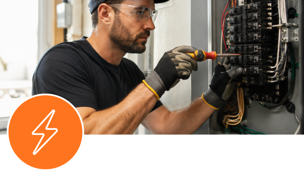 Electrician repairing an electrical panel during a home renovation
